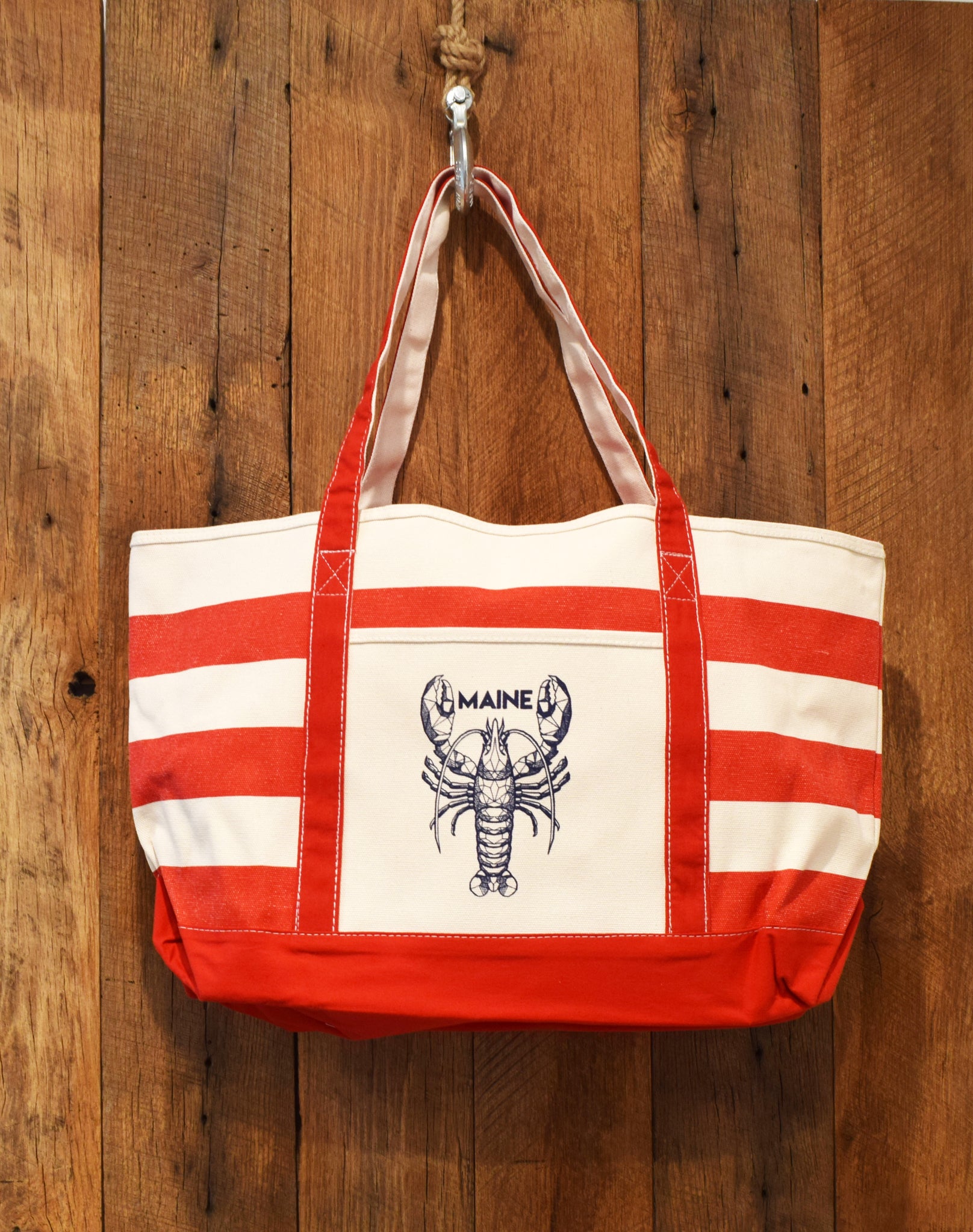 red beach bag with lobster print